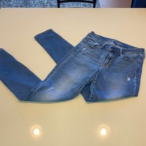 Denim jeans with small rips